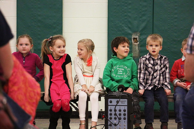 Preschool students at Kingdom Christian Academy eagerly await their time to show off what they've learned for their parents.