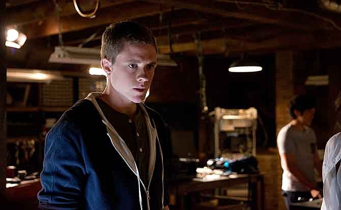 This photo released by Paramount Pictures shows, Jonny Weston as David Raskin, in a scene from the film, "Project Almanac," from Insurge Pictures, in association with Michael Bay.