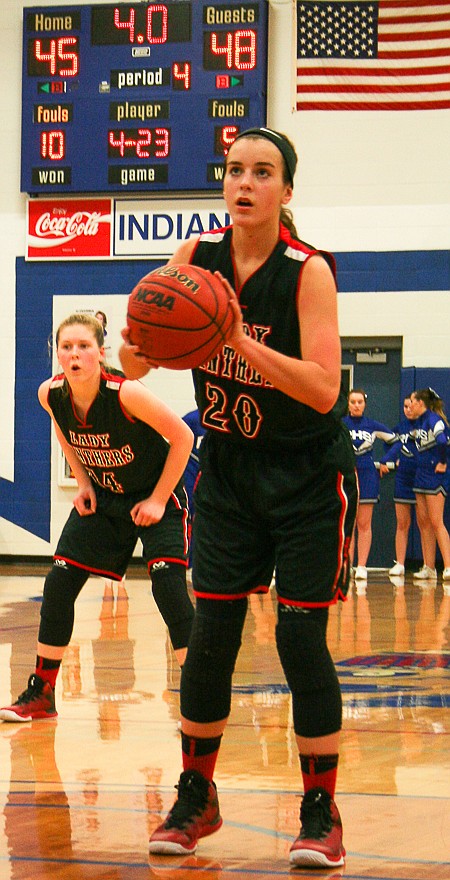 Prairie Home sophomore Rachel Distler (20) prepares to shoot a free throw in the closing seconds of Friday night's game at Russellville. Distler had 10 points in her team's 49-45 win.
