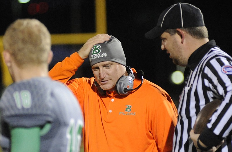 Blair Oaks head coach Brad Drehle walks the sideline during a game last season against Warsaw at the Falcon Athletic Complex.