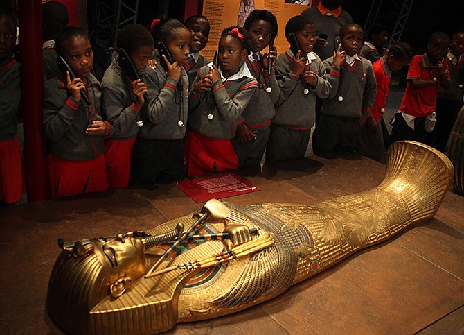Schoolchildren roam an exhibition of replicas of Tutankhamun's treasures at an exhibition at a Krugersdorp, South Africa, casino, brought to South Africa by Egypt's former top antiquities official Zahi Hawass. In an interview with the Associated Press, Hawass declared "Egypt is safe" adding antiquities sites are safe.'