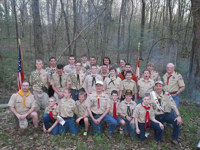 Troop 120 holding a Court of Honor in the forest located at the residence of Richard and Carole Schroeder. The Troop holds three of these events every year. This is when the Scouts are recognized for the awards they have earned.