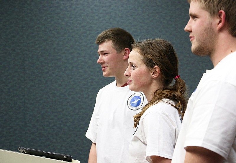 South Callaway High School students share recipes from their Bulldog Bakeshop with the school board Wednesday night. One student tried to make a healthy cherry chocolate smoothie. After he and his classmates tried it, they decided the smoothie would not make it into the Bulldog Bakeshop's lineup.