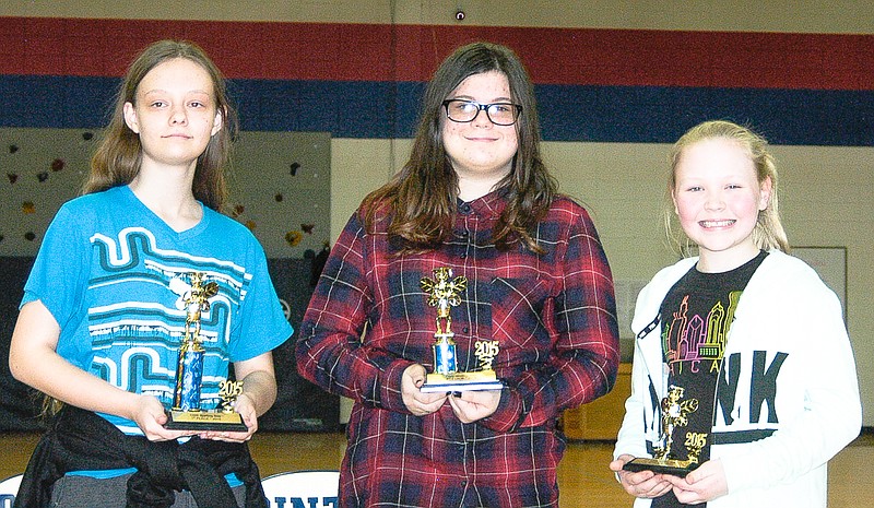 Democrat photo / David A. Wilson

Winners of the California Middle School Spelling Bee held Friday, Feb. 6, are, from left: first place - Taylor Barnes; second - Lily Ogg; and third - Lauren Belle Geiser.