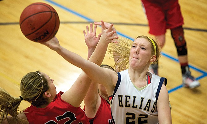 
Helias forward Kaitlyn Cowellputs up a layup after grabbing a rebound Tuesday evening
during the Lady Crusaders' matchup against Mexico in Rackers Fieldhouse.