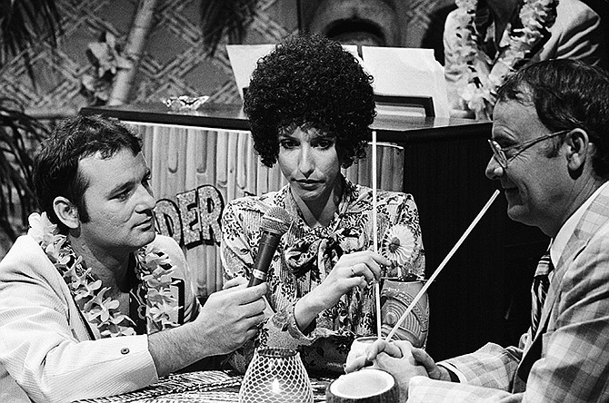 In this May 24, 1980 photo, Bill Murray, Laraine Newman and Buck Henry perform in a skit from "Saturday Night Live," in New York. The long-running sketch comedy series will celebrate their 40th anniversary with a 3-hour special airing Sunday at 8 p.m. EST on NBC.