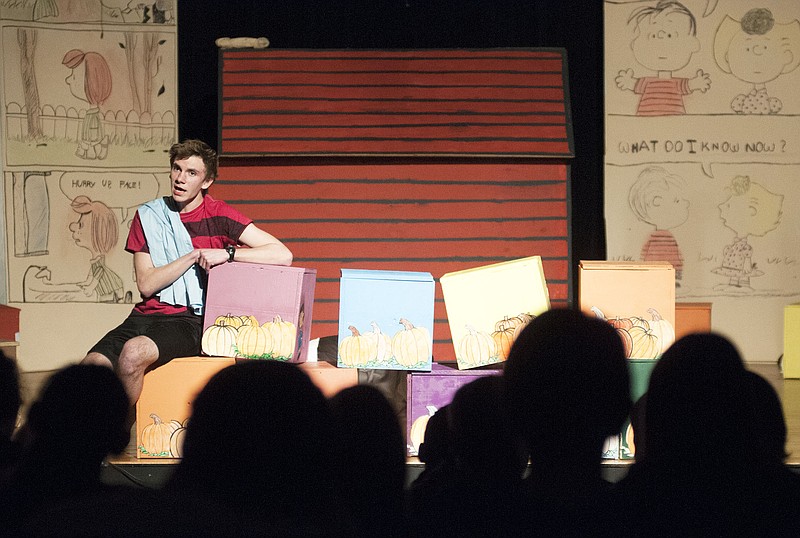 Linus Van Pelt, played by Fulton High School student Jared Eliuk, sings about the Great Pumpkin on Thursday inside the high school auditorium during a presentation of Snoopy: The Musical.