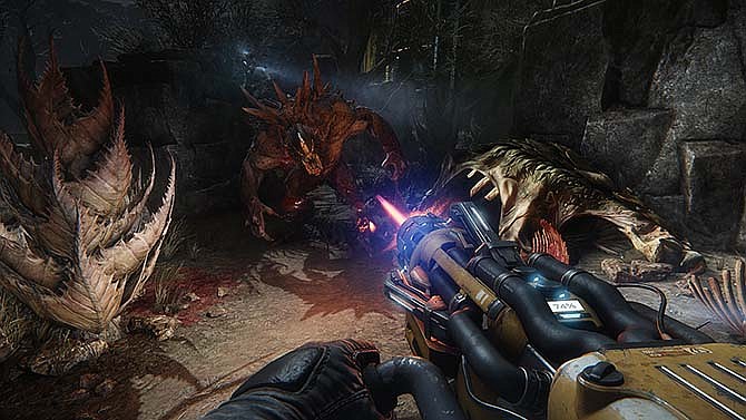 This photo provided by Take-Two Interactive Software Inc. shows a scene from the video game "Evolve" (2K Games, for PlayStation 4, Xbox One, PC, $59.99), in which a hunter confronts a Goliath on an alien planet. (AP Photo/Take-Two Interactive Software Inc.)