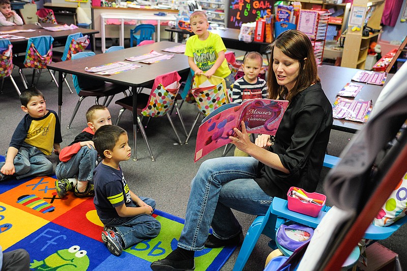 Jodeen Maness read to her students in California Elementary School's pre-kindergarten class.