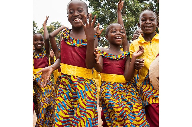 Members of the African Children's Choir dance during a performance. The choir will be coming to town Sunday.