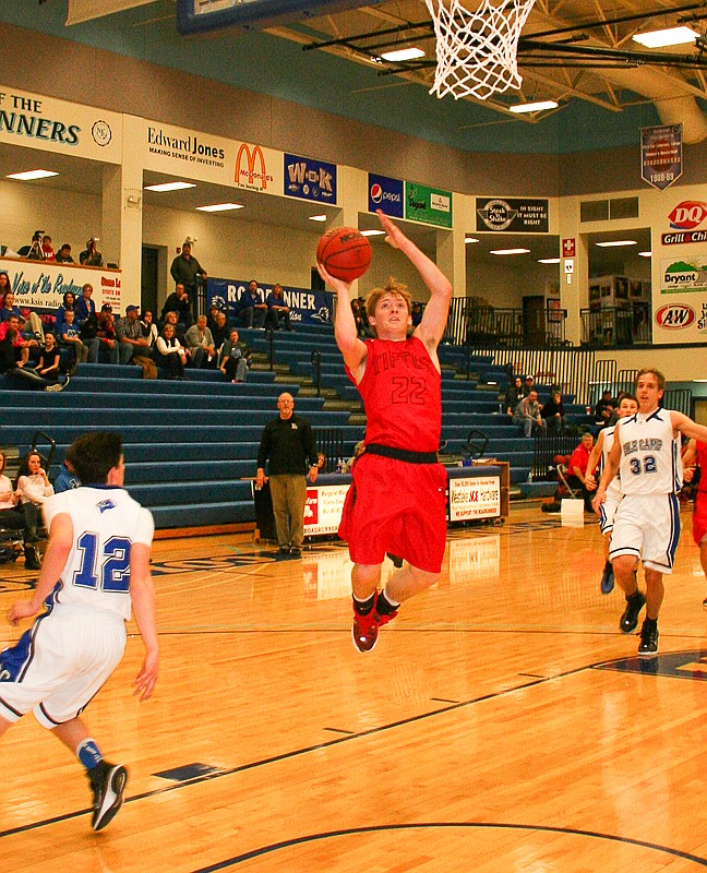 Tipton senior Logan Hirst goes up for a layup in his team's semifinal game against Cole Camp at last week's Kaysinger Conference Tournament in Sedalia. The Cardinals beat Cole Camp, 44-37, but lost to Sacred Heart in Saturday's final.