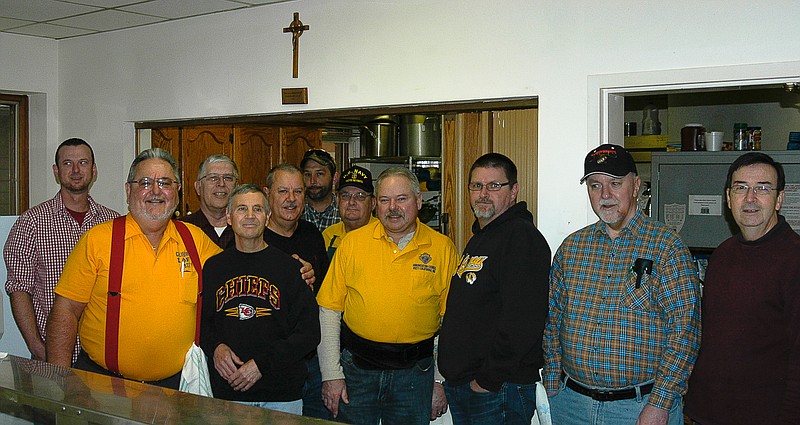 Working at the Knights of Columbus rope sausage breakfast fundraiser Sunday Feb. 15, are, from left, Richard Cotten, Charley Roll, Ted Musterman, Larry Dahler, Bob Walters, Wes Schuster, David Bax, Mike Taubey, Jerry Hoback, David Distler and David Garnett.