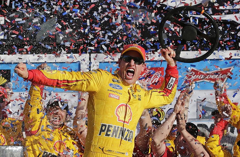 Joey Logano celebrates Sunday in Victory Lane after winning the Daytona 500 at Daytona International Speedway in Daytona Beach, Fla.