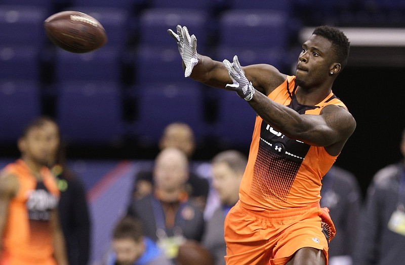 Dorial Green-Beckham reaches to make a catch during drills last week at the NFL Combine in Indianapolis.
