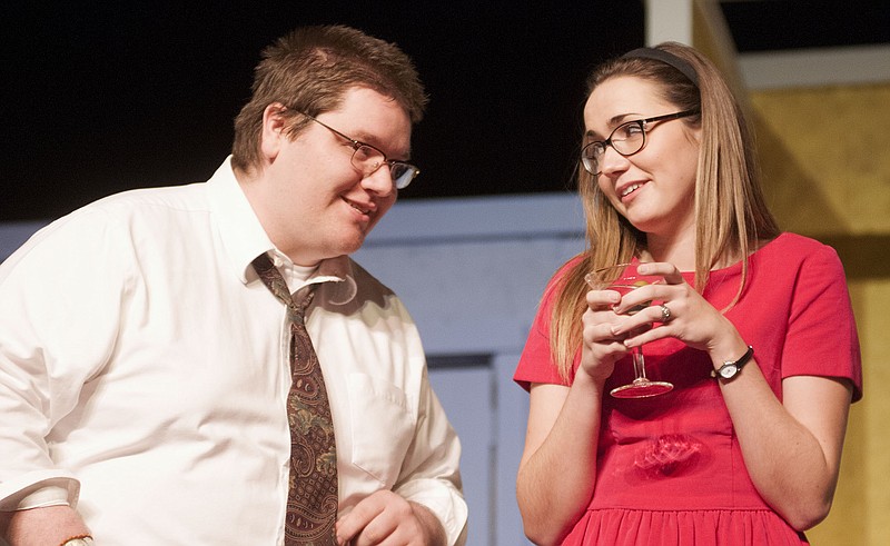 Frank Foster, played by William Woods University student T.J. Green, talks to Mary Detweiler, played by Bethany Elliott of Jefferson City, during a dinner party in the William Woods University production of "How the Other Half Loves." The play - set in 1971 - explores how one love affair dramatizes the lives of three couples. "How the Other Half Loves" premieres 7:30 p.m. today at Dulany Auditorium on the William Woods campus. The show continues until March 1.