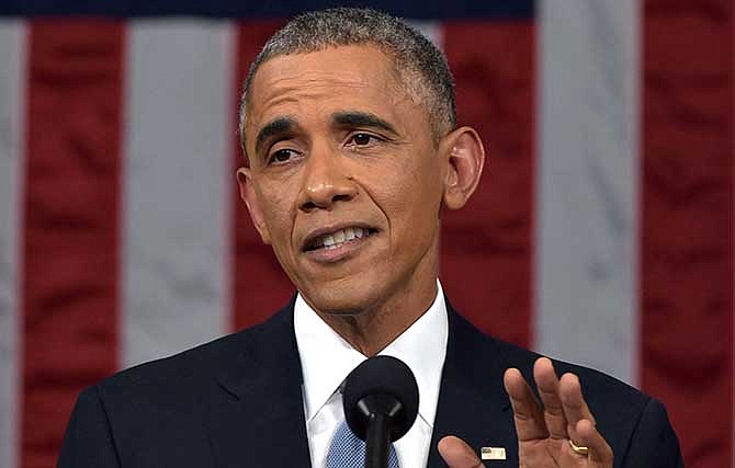 In this Jan. 20, 2015, President Barack Obama delivers his State of the Union address to a joint session of Congress on Capitol Hill in Washington. The White House said Tuesday, Jan. 27, it is dropping a proposal to scale back the tax benefits of college savings plans amid a backlash from both Republicans and Democrats. Obama made the proposal as part of his State of the Union address. It was part of Obama's plan to consolidate and simplify a sometimes confusing array of tax breaks for college students.