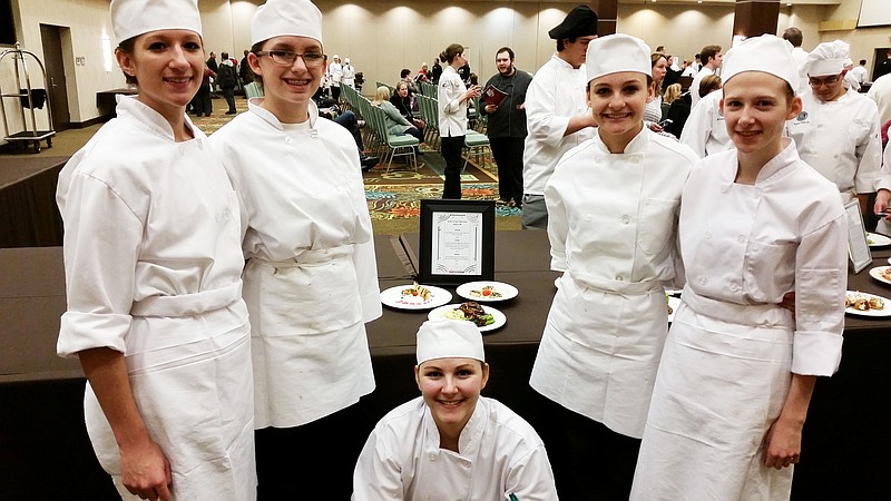 Alexis Wetherall (Grade 12), Jillian Potts (Grade 10), Alyssa Laughlin (Grade 10)Haley Pate (Grade 11) and Devin Willenburg (Grade 12) pose with their finished meal at the 2015 Missouri ProStart Invitational Culinary Competition at the Oasis Ramada Inn Convention Center in Springfield.