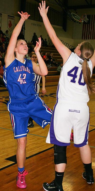 California sophomore Cameron Meyer (42) puts up a shot against Hallsville in a Class 3, District 8 semifinal at South Callaway on Wednesday, Feb. 25. Hallsville won the game, 44-40.