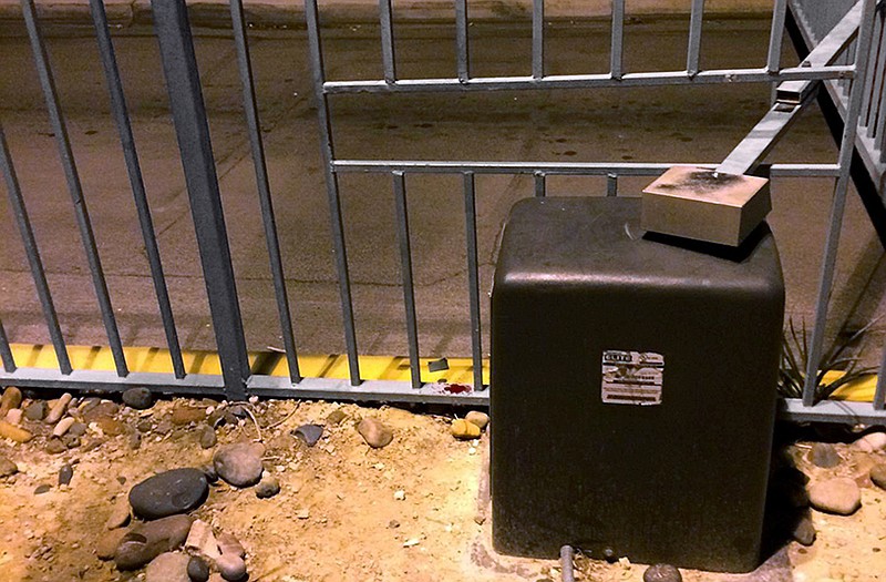 This is the automatic gate apparatus in which an 8-year-old boy apparently died Tuesday after being struck by the metal arm that opens the entryway to the North Las Vegas housing community where he lived. The arm that opens and closes the gate moves back and forth in the space measuring 7 inches tall and nearly 3 feet wide that Matthew Cattlet was known to play in.