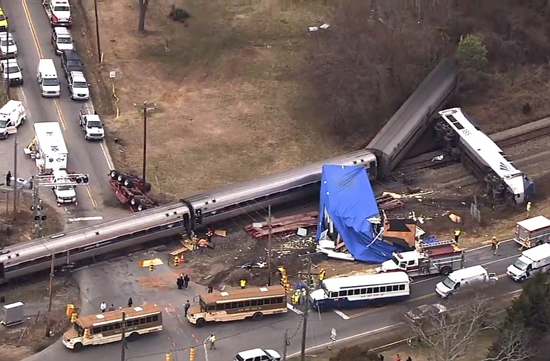 Authorities respond to a collision between an Amtrak passenger train and a truck Monday in Halifax County, N.C.