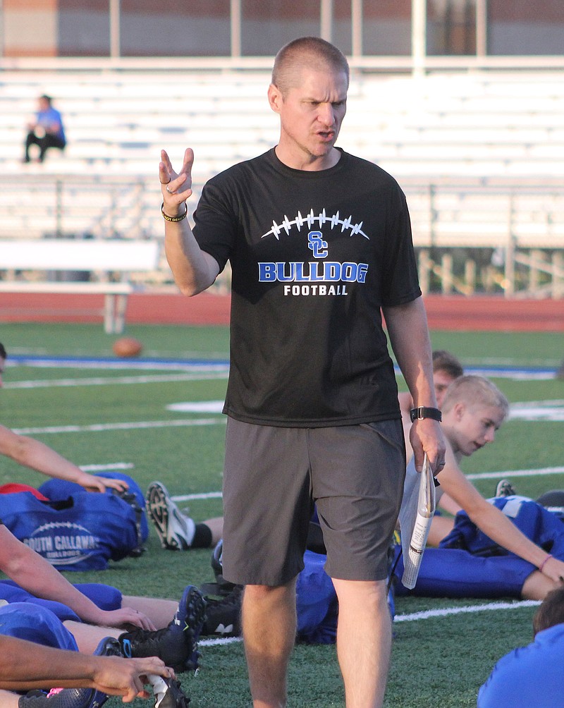 Tim Rulo talks to his players during a practice last season at South Callaway High School in Mokane. Rulo was named the head football coach Monday at Helias.