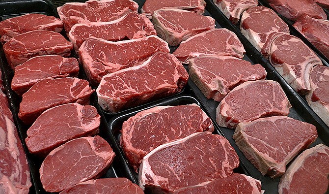 Steaks and other beef products are displayed for sale at a grocery store in McLean, Virginia. The meat industry is seeing red over the dietary guidelines. 