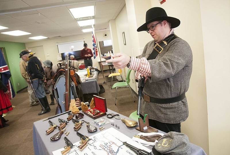 Craig Wenzel of Vandalia talks about Civil War-era firearms during an educational event Saturday at the Callaway County Library.