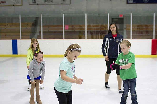 Young skaters practice their routine for the annual Washington Park Ice Arena Ice Show at the arena Tuesday evening.