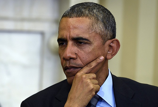 President Barack Obama listens during his meeting last week with European Council President Donald Tusk in the Oval Office of the White House in Washington. For the second consecutive year, the Obama administration more often than ever censored government files or outright denied access to them under the U.S. Freedom of Information Act, according to a new analysis of federal data by the Associated Press. 