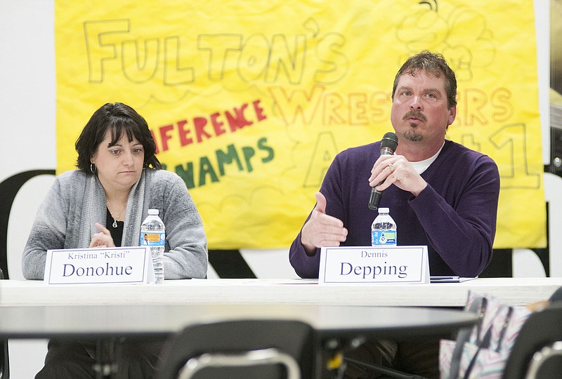 Dennis Depping, Fulton School Board incumbant, answers a questions during the Fulton Community Teachers Association forum Thursday night. Fellow incumbant Kristi Donohue (left) also attended the forum.