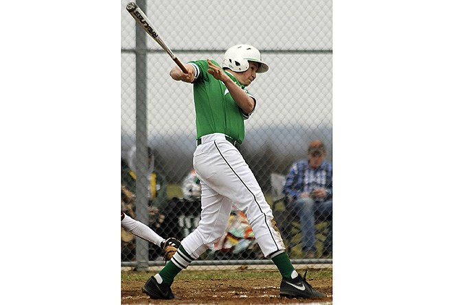 Blair Oaks' Brent Heckemeyer, who led the Falcons in runs scored last year, raps a hit during a game against Eldon last spring.