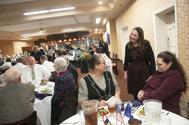 Julie Boyd Uhls, 2015 Kingdom of Callaway Supper president, chats inside William Woods University's Tucker Dining Hall during the annual celebration. The 110th Kingdom of Callaway Supper celebrated people who've made contributions to the community.