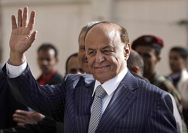 Yemen's President Abed Rabbo Mansour Hadi gestures in this photo. Hadi fled his palace in Aden for an undisclosed location Wednesday as Shiite rebels offered cash bounty for his capture and arrested his defense minister.