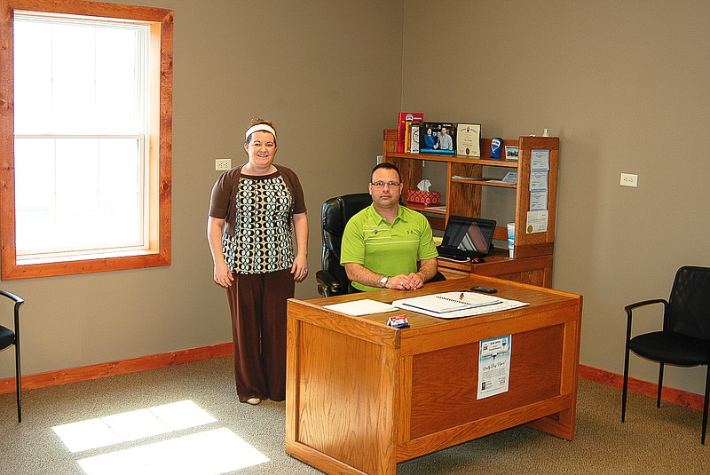 Democrat photo / David A. Wilson

In the newly remodeled office of the California RE/MAX business are, standing, Realtor Heather Borghart and, seated Broker/Owner Shane Dunnaway.