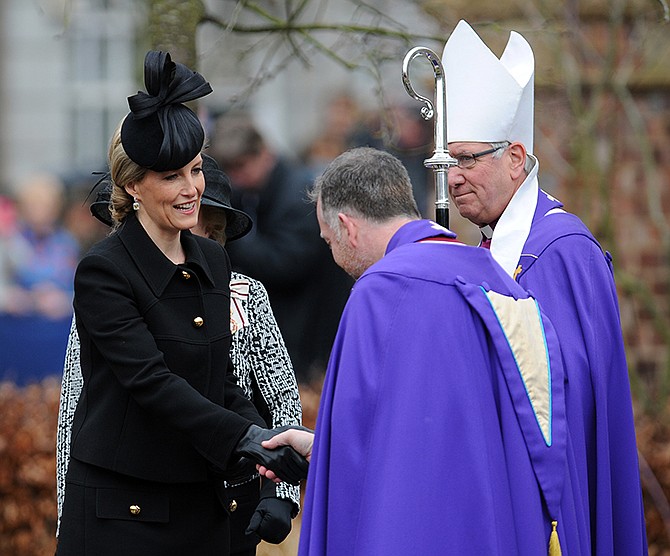 Sophie The Countess of Wessex is greeted by the Dean of Leicester Dean David Monteith, middle, and the Bishop of Leicester Tim Stevens, right, on arrival at Leicester Cathedral to attend a service for the re-reinterment of the mortal remains of Richard III at Leicester Cathedral, Leicester, England, Thursday. The skeleton of King Richard III was discovered in 2012 in the foundations of Greyfriars Church, Leicester, 500 years after he was killed in the Battle of Bosworth Field. 