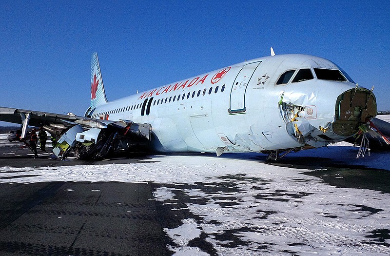 An Air Canada Airbus A-320 is shown at Halifax International Airport after making an "abrupt" landing and skidding off the runway in bad weather early Sunday.