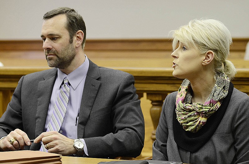 Defendant Ann Metternich responds to Judge Dan Green after he asked her if she was sure she wished to waive a jury trial. Seated next to her is her attorney, Dan Hunt.