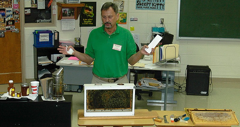 Democrat photo / David A. Wilson

Mike Robertson, known better locally as the Burgher Haus owner, presents "Beekeeping is My Hobby." He related several stories, several of which were to promote safety when going into beekeeping. He also mentioned a study which indicates that the calmer, more docile bees produce less honey than the active ones always out to search out nectar and protect the hive from interlopers, including the beekeeper.