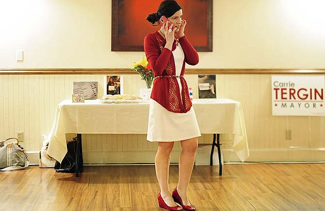 Carrie Tergin, who became Jefferson City mayor-elect after the votes were counted, receives a phone call during her election watch party on Tuesday night.