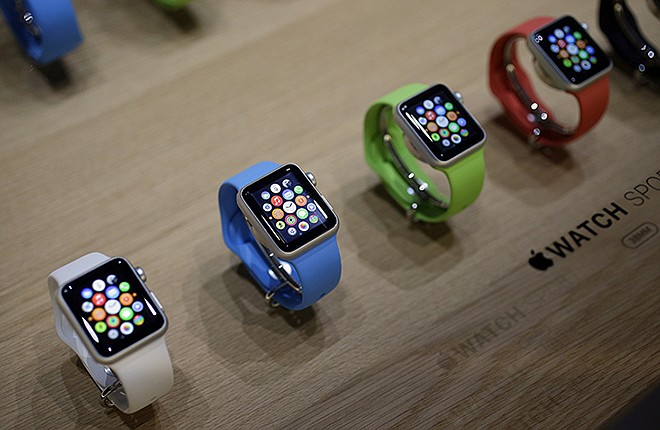 Varieties of the new Apple Watch appear on display in the demo room after an Apple event in San Francisco. Pre-orders for the Apple Watch start today. The device costs $349 for a base model, while a luxury gold version will go for $10,000.