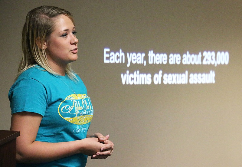 Alaina Leverenz, junior, discusses statistics related to sexual assault at William Woods University Monday. Leverenz has organized a series of events on campus related to sexual assault awareness month, which is April. 