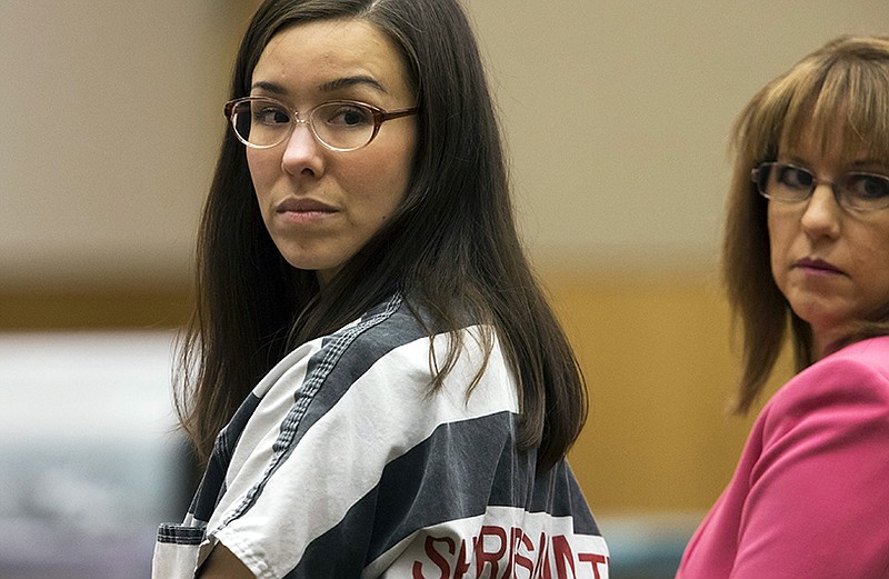 Jodi Arias, left, looks on next to her attorney, Jennifer Willmott, during her sentencing Monday in Phoenix.