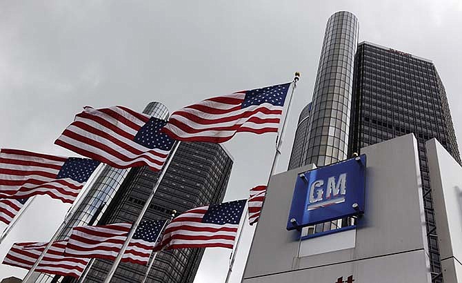  This April 21, 2009, file photo shows General Motors world headquarters in Detroit. A federal bankruptcy judge ruled Wednesday, April 15, 2015, that General Motors is shielded from death and injury claims potentially totaling billions of dollars tied to defective ignition switches in certain GM small cars. 