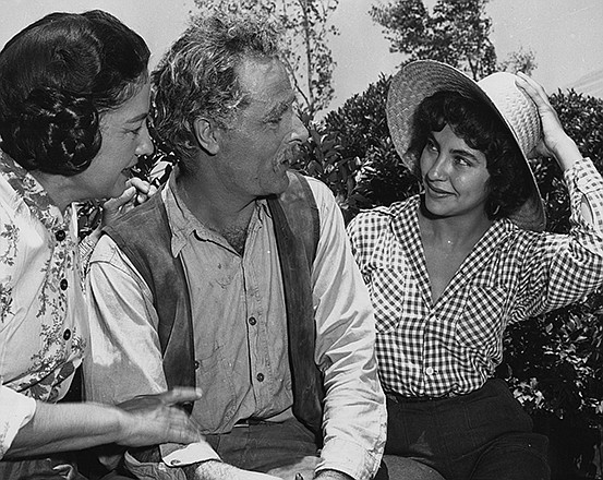 This undated photo provided by the George Stevens Collection shows, Elsa Cardenas, right, as the Mexican American nursing student "Juana" who marries "Jordan Benedict," played by Dennis Hopper, in "Giant." A new documentary, "Children of Giant," examines the Mexican-American child actors who appeared in the 1956 blockbuster movie "Giant," but later were forced to view the film in segregated theaters.