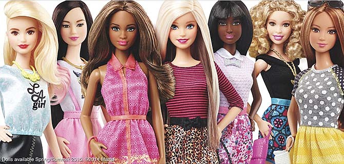 This photo provided by Mattell shows new Barbie dolls. Mattel, the toy company behind the plastic dolls, said there were some signs of improvement for Barbie after years of falling sales. The new Barbie has different ethnicities to better relate to multicultural girls and their mothers.