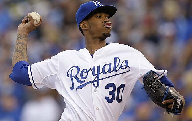 Kansas City Royals starting pitcher Yordano Ventura (30) delivers to an Oakland Athletics batter during the first inning of a baseball game at Kauffman Stadium in Kansas City, Mo., Saturday, April 18, 2015.