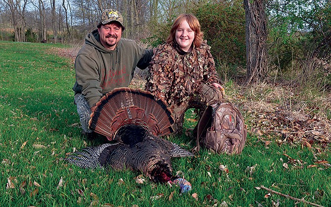 Brandon Butler and his nephew, Brenden McGuire, pose with a beautiful Howard County gobbler. Youth turkey hunters killed 4,441 birds during Missouri's 2015 spring youth season. 