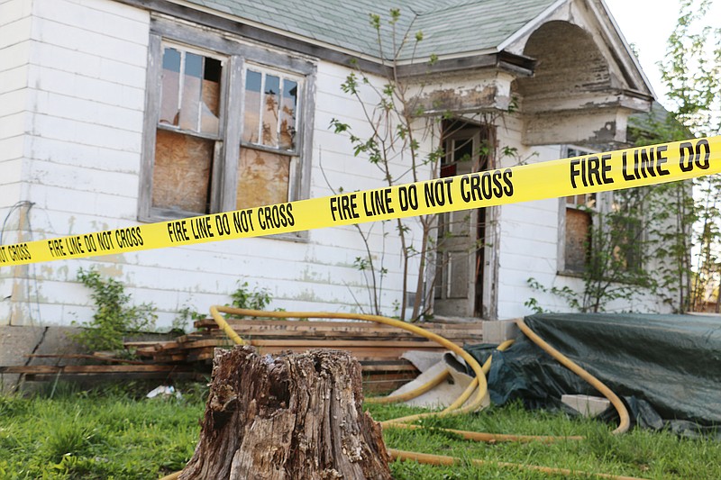 Fulton Police taped off a house on Vine Street in Fulton after Fulton firefighters distinguished a fire around 5:40 p.m. Monday. The Fire department labeled the incident to be "suspicious in nature" and called in the Missouri state fire marshal for assistance in the investigation. 