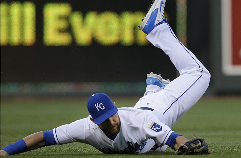 Royals left fielder Alex Gordon catches a fly ball hit by Danny Santana of the Twins in the first inning of Monday night's game at Kauffman Stadium.