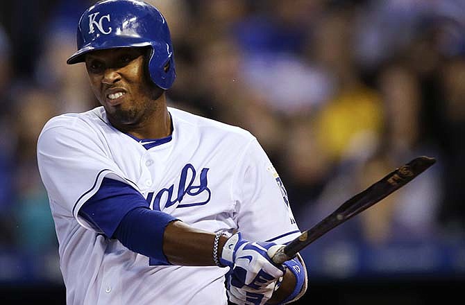 Kansas City Royals shortstop Alcides Escobar breaks his bat fouling off a pitch from Minnesota Twins starting pitcher Mike Pelfrey during the third inning of a baseball game at Kauffman Stadium in Kansas City, Mo., Wednesday, April 22, 2015.